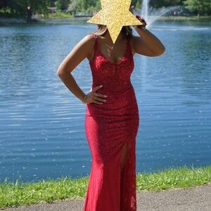 ELLIE WILDE PROM DRESS EW35013 
Embroidered tulle embellished with sequins.